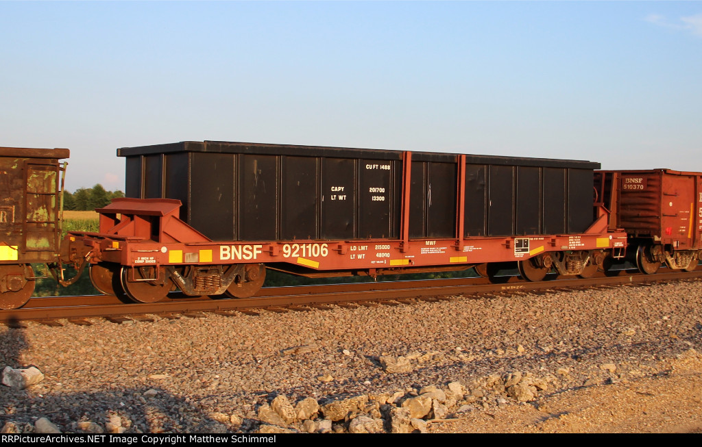 BNSF Odd Ball Flat With Dumpster (?)